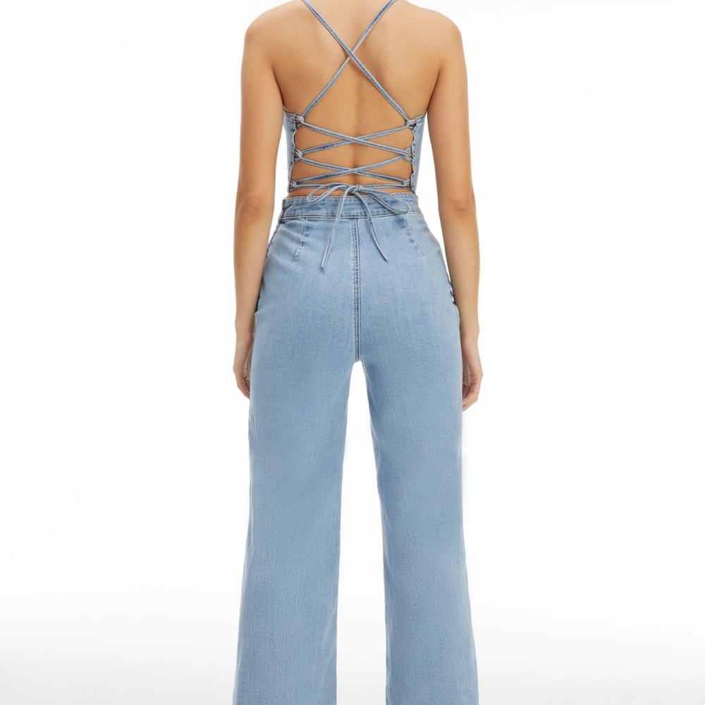 NWT Good American denim jumpsuit NWT size 2. Actual color is dark blue